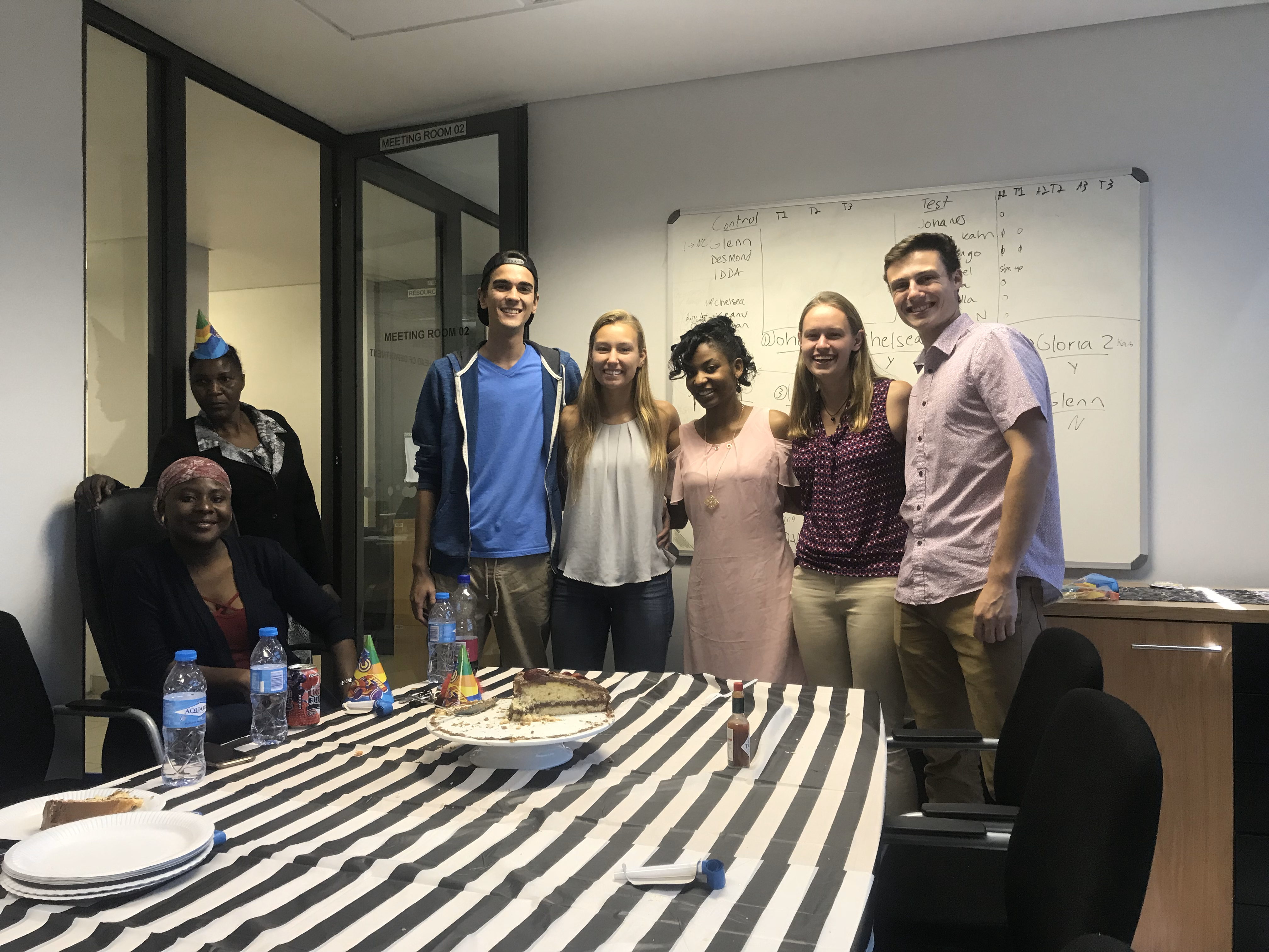 My team members, sponsors, and I eating cake